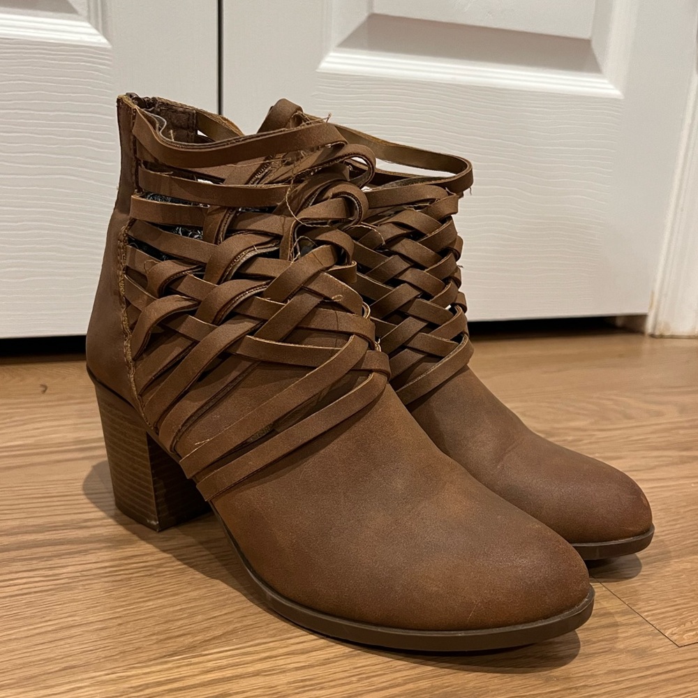 Only worn once, womens brown heeled booties.